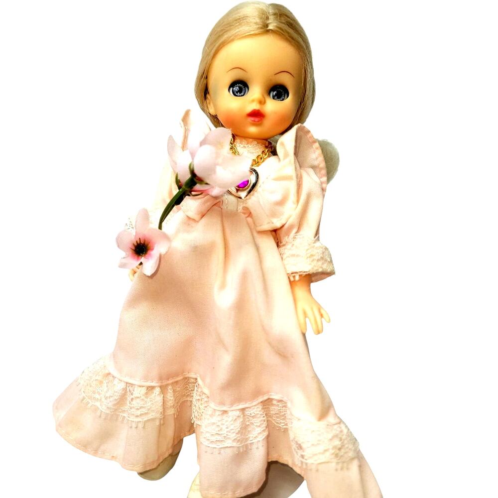8" Vintage "Symbol of Quality" Little Girl Doll With a Sweet Heart Necklace